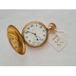 A gents hunter rolled gold pocket watch by TERRY OF MANCHESTER with seconds dial