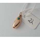 Gold bean charm set with turquoise 1.3g inc