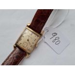 A gents rectangular wrist watch by WALTHAM with seconds dial in 9ct