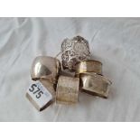 A attractive pieced napkin ring London 1907 and 5 others 203 gms