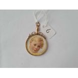 A double sided photo locket in 9ct - 7.6gms