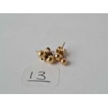 Two pairs of ball ear studs in 9ct