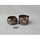 Two embossed napkin rings one with vine decoration B'ham 1896 55 gms
