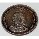 A 1887 shilling deeply toned