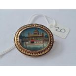 A Victorian hand painted miniature of the golden temple of Amritsar in 15 CT gold tested frame