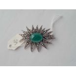 A stylish green stone & marcasite brooch