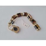 A VICTORIAN SCOTTISH HARD STONE BRACELET IN 15CT GOLD 7 INCHES LONG