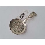 A Georgian caddy spoon the bowl embossed with a maiden and her dog B'ham 1817 by IB