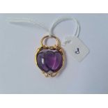 A gold framed amethyst heart pendant 7.8g