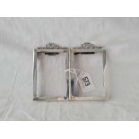 A twin folding photo frame with ribbon decoration 4 1/4 inches high B'ham 1912