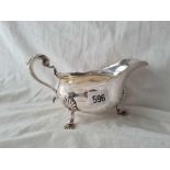 A late Victorian Georgian style sauce boat on 3 bold legs 8 1/2 inches wide London 1897 Goldsmiths