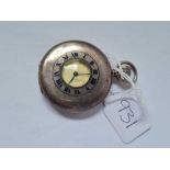 A gents silver half hunter pocket watch with seconds dial W/O slight damage to face