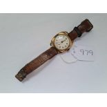 A 1920s ladies gilt wrist watch with seconds dial