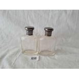 A pair of oval jars with glass bodies London 1914 by F Ltd