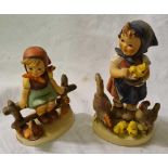 Two Hummel figures of girls one with chickens