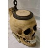 A Italian skull stein with pewter mounted cover 7 inches high