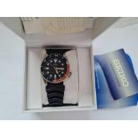 A modern Seiko gents wrist watch with box and papers