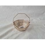 A small sweet basket with swing handle 3 inches wide B'ham 1919 by S&B