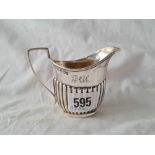 A oval half fluted cream jug Sheffield 1895 by JH 57 gms