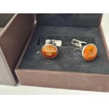 A boxed set of contempory silver Dunhill cufflinks
