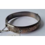Silver floral engraved hinged bangle