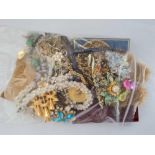 A bag of assorted costume jewellery - 620gms