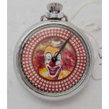 A vintage clown spinning gambling gaming pocket watch