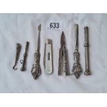 A pair of silver handled scissors, manicure items etc.