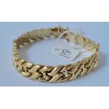 14CT GOLD ARTICULATED LINK BRACELET IN 9CT 19.2g