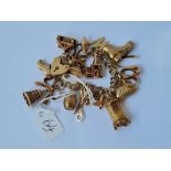 9CT VINTAGE CHARM BRACELET WITH 15 ASSORTED CHARMS 34.8G