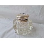 A heavy glass and sivler mounted ink pot with hinge cover - 4" diameter - Sheffield 1903?