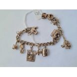 Silver charm bracelet set with 9 charms 48.1g