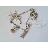 A heavy silver necklace with silver charms 34.3g