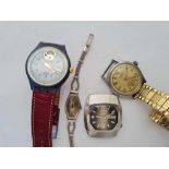 Four assorted gents wrist watches in bag