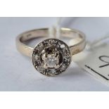 A diamond cluster ring (stone out) in 14ct white gold size I 2.3g inc
