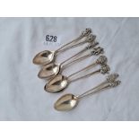 A set of eight Siamese spoons with figure finials - unmarked - 144 g.