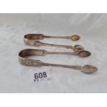 Two pairs of fiddle pattern sugar tongs - London 1824 and the other - London 1835 - 80g.