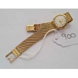 A LADIES OMEGA WRIST WATCH IN 9CT GOLD WITH 9CT OMEGA MESH STRAP - 29.5 GMS INC