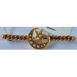 A pretty pearl and high ct gold bar brooch with crescent and star design - 2.6 gms