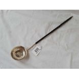 A Georgian toddy ladle inset with a shilling - 1758