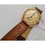A gents wrist watch by Rone " sportsman's" with seconds dial in 9ct gold