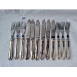 A set of six Sandringham fish knifes and forks with silver handles Sheffield 1939