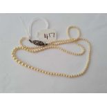 A attractive graduated pearl necklace with silver and marcasite clasp