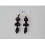 A pair of black glass earrings
