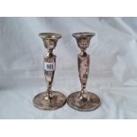 A pair of candle sticks with baluster stems 7 1/2 inches high B'ham 1970 by BES