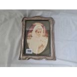 An easel shaped photo frame with moulded boarder, 9” high, B'ham 1927