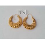 A large pair of ornate retro 9ct earrings 4.8g