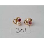 A pair of pearl and pink stone 9ct earrings