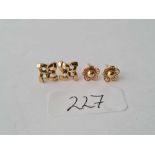 Two pairs of 9ct ear studs (no backs)