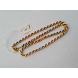 A three coloured 9ct gold rope twist neck chain 6.9g